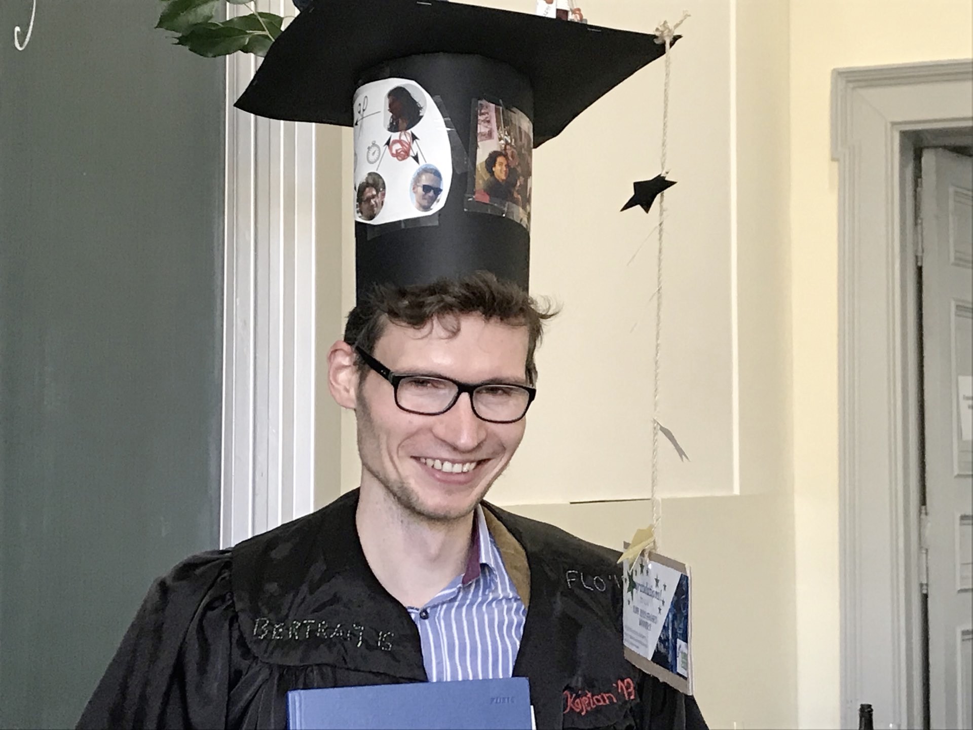 Torsten Gross wearing doctoral cap and robe