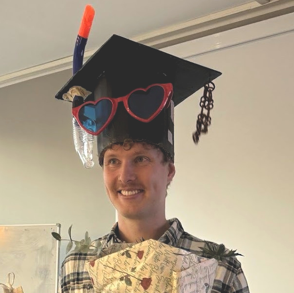 Fabian Reith wearing doctoral cap