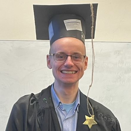 Matthias Fischer wearing doctoral cap and robe