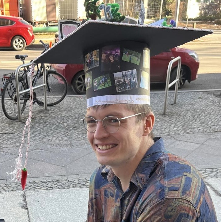 Tom Kaufmann wearing doctoral cap